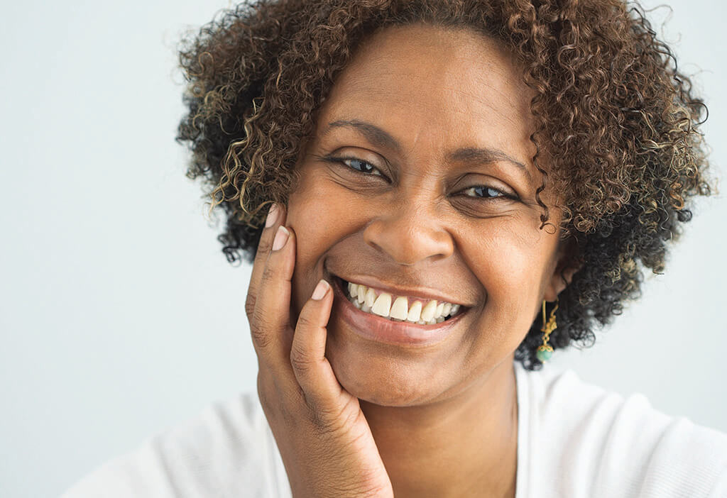 woman smiling for sepsis article