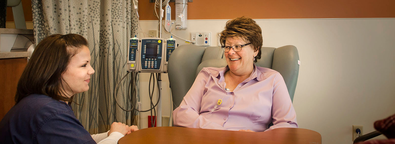 Cancer Center nurse with chemotherapy patient