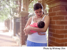 Mother breastfeeding her infant child