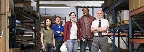 employer-services-fpo-500 Group photo of workers in a warehouse.