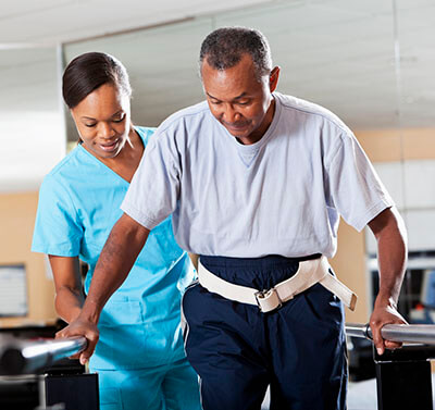 Therapist with patient doing gait training